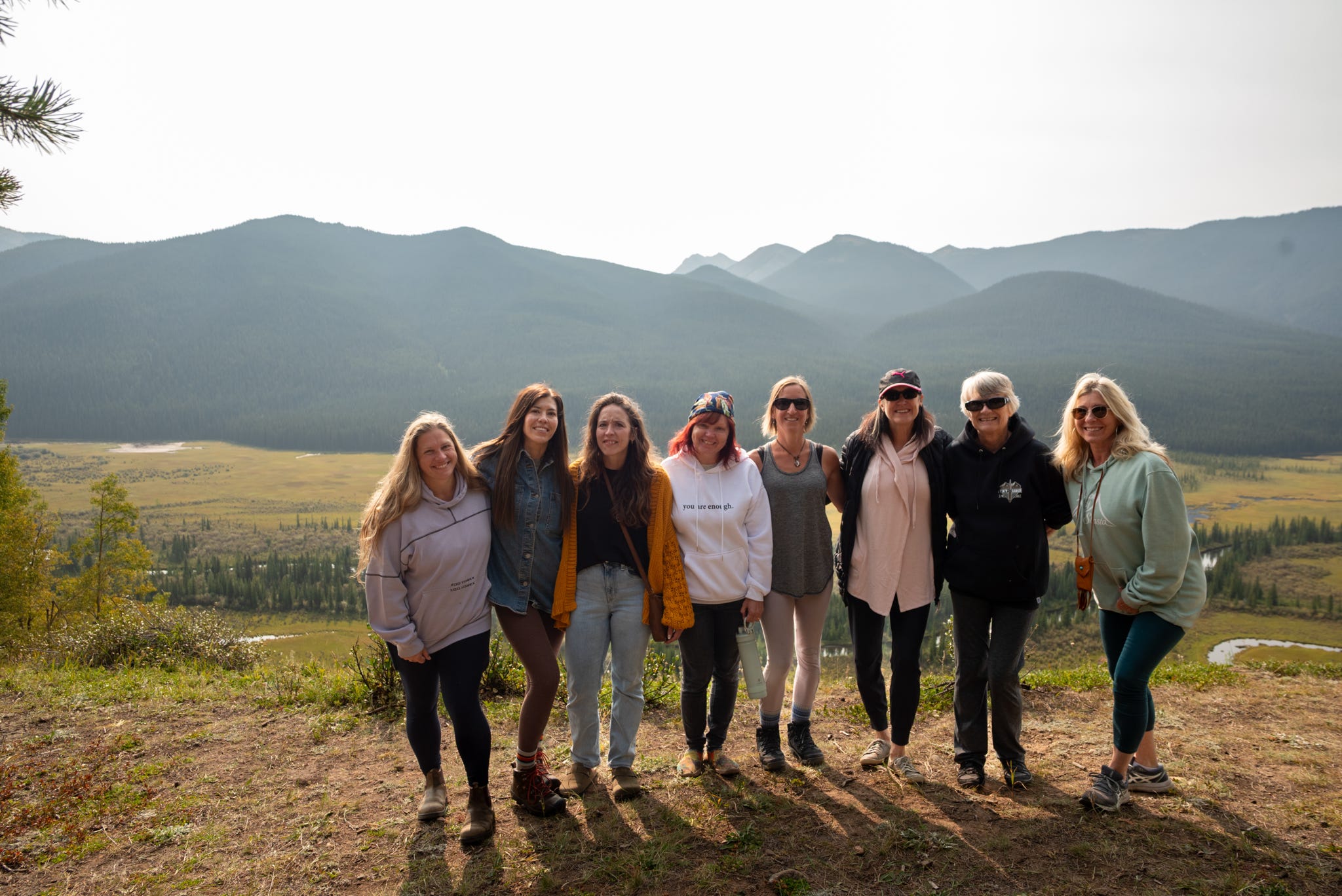 Retreat group at mountain viewpoint